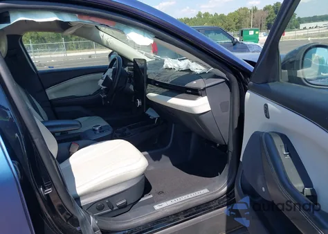 2021 Ford Mustang Mach-E Premium z USA, uszkodzony, nr VIN 3FMTK3SU3MMA03885